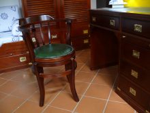 Sedia girevole con seduta in legno o pelle